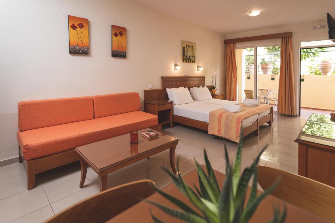 Helios Apartments Като Дарацо Стая снимка