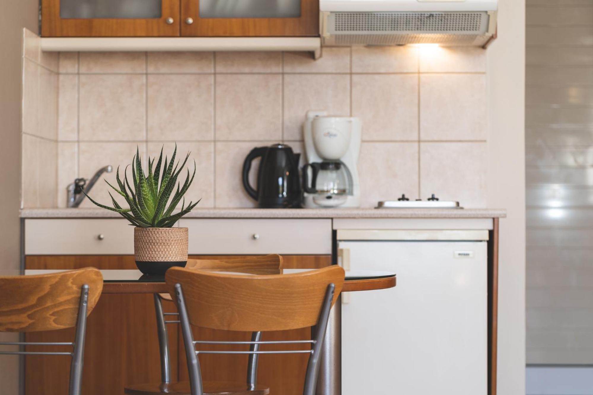 Helios Apartments Като Дарацо Стая снимка